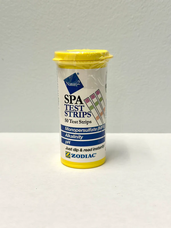 Yellow and blue container labeled "spa test strips" along with various chemical ingredients 